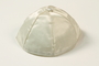 White satin yarmulke with a button owned by a German Jewish refugee