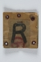 Plastic covered Rustung [Armament] badge worn by a Polish Jewish worker in Beskiden labor camp