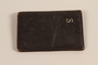 Dark brown leather wallet with metal S used by a Jewish refugee boy