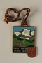 Decorative medal with a Swiss town and alps owned by a German Jewish businessman in Shanghai