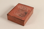 Metal school supply box inscribed in Yiddish used by a Polish Jewish teenager