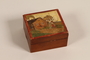 Wooden box painted with a woman in Lithuanian folk dress given to a German Jewish refugee