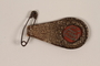 Red enamel permit tag in leather holder issued to a German Jewish refugee