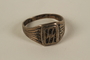 SS insignia ring taken from a concentration camp guard by inmates to give to a US soldier