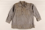 Shirt taken from an SS storeroom at a concentration camp by a Hungarian Jewish inmate and worn after liberation