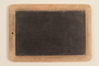 Small slate and wood blackboard used by a student in Nazi Germany
