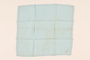 Light blue handkerchief with a pink monogram carried by a Kindertransport refugee