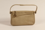 Beige leather purse with decorative piping used by a Kindertransport refugee