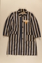 Concentration camp striped uniform coat with yellow triangle worn by a Polish Jewish female inmate