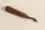Leather creaser with a curved needle point head used by a Polish Jewish refugee conscripted as a shoemaker by the Soviet Army