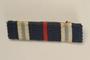 Blue, white and red bar ribbon that belonged to a Jewish German WWI veteran and concentration camp inmate