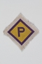 Unused forced labor badge, yellow with a purple P, to identify a Polish forced laborer