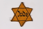 Star of David badge on floral backing printed Jude owned by a Czech Jewish survivor
