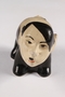 Ceramic figurine of a skunk with Adolf Hitler's face