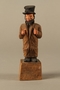 Wooden folk art figurine of a Jewish freeloader