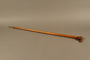 Wooden cane with a grip shaped as a Jewish man’s elongated nose