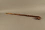 Crook handled staff with a carved Jewish head with bulging eyes
