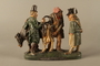 Terracotta figure group of 2 Jewish traders selling an old used cow to a gentile