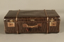Large suitcase with a broken handle used by a young Austrian Jewish refugee during emigration