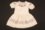 Embroidered dress made for a young Austrian Jewish refugee before her emigration