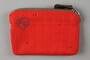 Monogrammed red pouch used by an American concentration camp inmate
