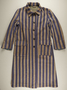 Concentration camp uniform coat worn by an inmate