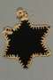 Black plastic Star of David badge worn by a German Jewish forced laborer
