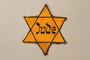 Star of David badge with Jude worn by a Jewish Czech woman