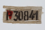 Prisoner badge with number and red triangle