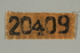 Numbered prisoner patch worn by a female Hungarian Jewish slave laborer