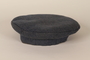 Dark blue concentration camp uniform cap worn by a Polish Jewish inmate