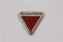 Commemorative red triangle Dachau badge 158831 owned by former inmate