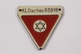 Commemorative red triangle Dachau badge 83918 owned by former camp inmate