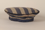 Concentration camp inmate uniform cap worn by an inmate of Auschwitz