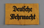 Yellow armband embroidered Deutsche Wehrmacht for use by laborers acquired by a US soldier