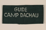 Green armband inscribed Guide Camp Dachau used by medical personnel after liberation and retrieved by a US soldier