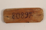 Identity tag issued and worn by Jewish man in Dachau concentration camp