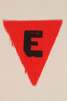 1989.295.2 front
Unused red triangle concentration camp patch with an E found by a US military aid worker

Click to enlarge