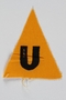 Unused yellow triangle concentration camp patch with a U found by a US military aid worker