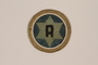 Circular leather Star of David badge worn in the Kovno Ghetto