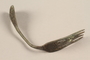 Bent metal fork recovered from Chelmno killing center