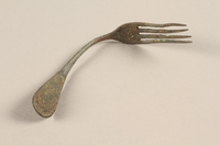1989.308.22 front
Bent metal fork recovered from Chelmno killing center

Click to enlarge