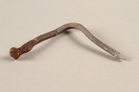 1989.308.28 side b
Nail recovered from Chelmno killing center

Click to enlarge