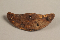 1989.308.6 bottom
Rusted heel plate with screw recovered from Chelmno killing center

Click to enlarge