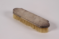 2005.600.3 front
Silver clothes brush used by a German Jewish woman while in hiding

Click to enlarge