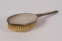 2005.600.4 front
Silver hair brush used by a German Jewish woman while in hiding

Click to enlarge