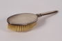 Silver hair brush used by a German Jewish woman while in hiding