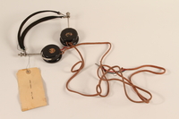 1996.36.14 front
Alfred Rosenberg's Nuremberg war crimes trial headphones

Click to enlarge