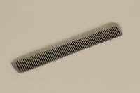 1996.61.3 front
Comb

Click to enlarge