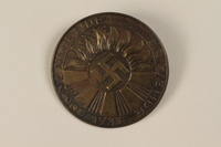 1996.75.33 front
Nazi Party election badge.

Click to enlarge
